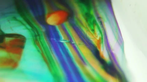 Liquid paint mixing artwork with splash and swirl Stock Footage 165165770
