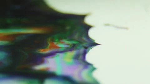 Liquid paint mixing artwork with splash and swirl Stock Footage 165165976