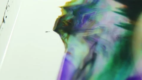 Liquid paint mixing artwork with splash and swirl Stock Footage 165167054