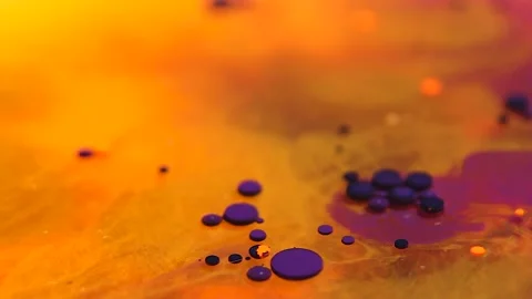 Liquid paint mixing artwork with splash and swirl Stock Footage 165173379