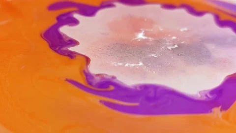 Liquid paint mixing artwork with splash and swirl Video stock 165174141