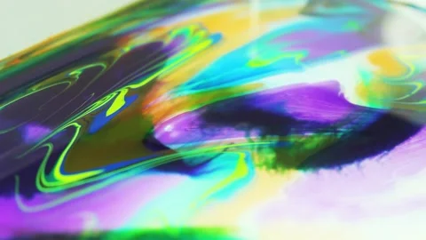 Liquid paint mixing artwork with splash and swirl Stock Footage 165184861