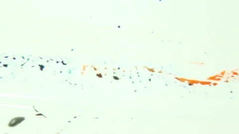 Liquid paint mixing artwork with splash and swirl Stock Footage 165185358