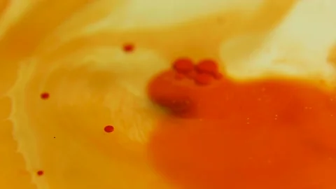 Liquid paint mixing artwork with splash and swirl Stock Footage 165185634