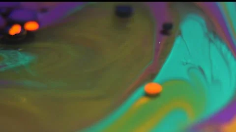 Liquid paint mixing artwork with splash and swirl Stock Footage 165186701