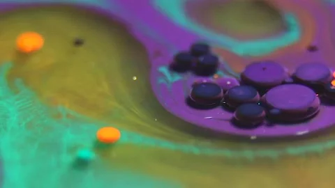 Liquid paint mixing artwork with splash and swirl Stock Footage 165186941