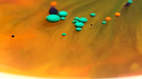 Liquid paint mixing artwork with splash and swirl Stock Footage 165187863