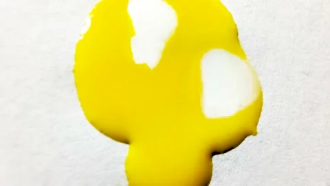 Liquid paint mixing artwork with splash and swirl Stock Footage 165353534