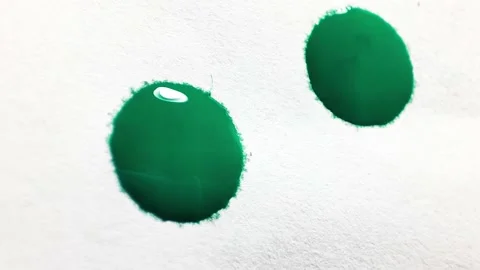 Liquid paint mixing artwork with splash and swirl Stock Footage 165353741