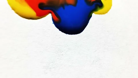 Liquid paint mixing artwork with splash and swirl Stock Footage 165353935