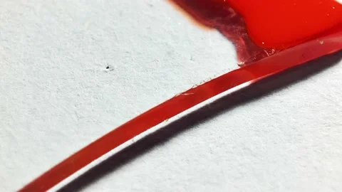 Liquid paint mixing artwork with splash and swirl Stock Footage 165357426