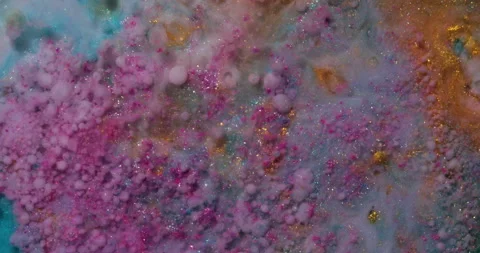 Liquid paint mixing artwork with splash and swirl Stock Footage 165848031