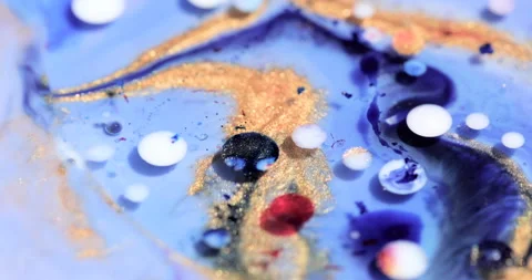 Liquid paint mixing artwork with splash and swirl Stock Footage 170390080