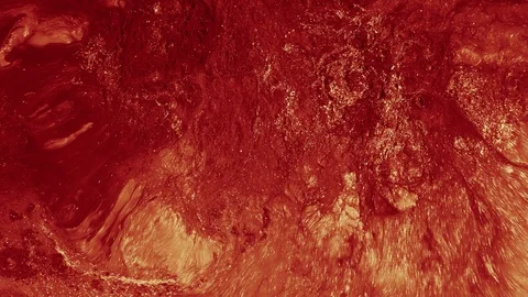 Liquid paint texture glitter red orange ink motion Stock Footage 125919073