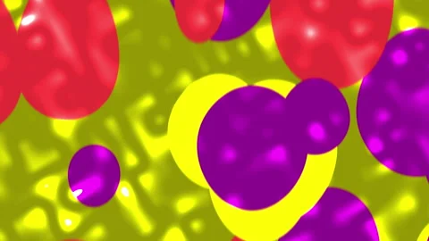 Liquid particles form swirling red and purple circles on a yellow background. Stock Footage 303451544