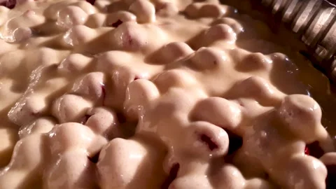 Liquid pie mix,cake mix in a mold. Filling of flour sweet biscuit with cherry. Stock Footage 303433290