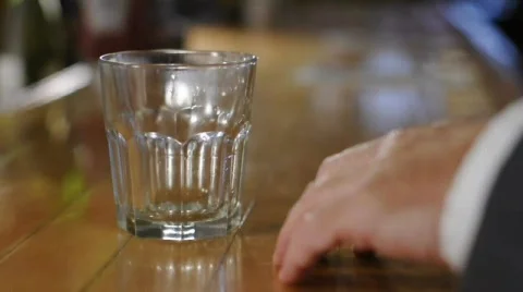Liquid Poured Into Drinking Glass Stock Footage