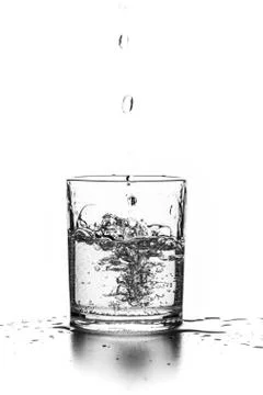 Liquid pouring into a glass Stock Photos