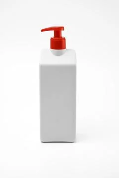 Liquid soap dispenser bottle with red pump Stock Photos