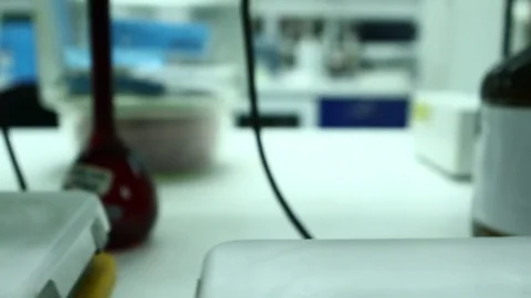 Liquid solutions being stirred by equipment Video stock 77046246