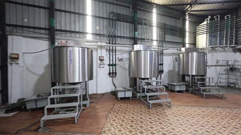 Liquid storage tank and reactor view at oil manufacturing unit Stock Footage 302276807