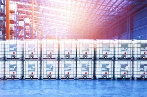 Liquid storage tank stack inside distribution warehouse. Industrial warehousing Stock Photos