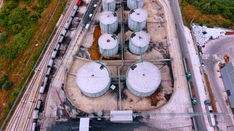 Liquid storage tanks and rail tanker wagons from above Stock Footage 340079841