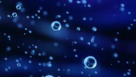 Liquid texture with drops on dark blue background. Gel cosmetic with molecule Stock Footage 239634185
