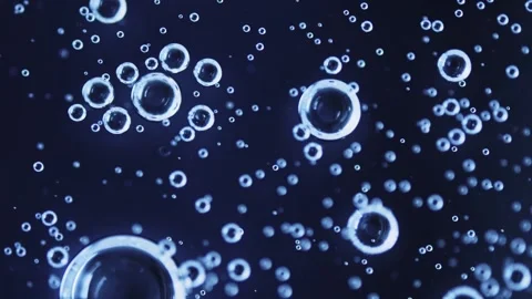 Liquid texture with drops on dark blue background. Gel cosmetic with molecule Stock Footage 241630017