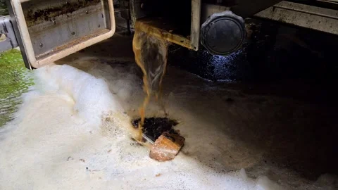 Liquid waste drainage of dissolved beechwood tar and foam during factory cleanin Video stock 330754249