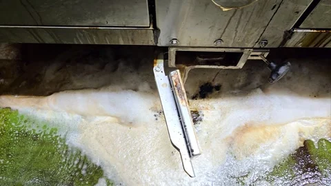 Liquid waste drainage of dissolved beechwood tar and foam during factory cleanin Video stock 330754254