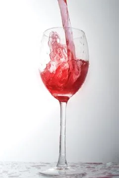Liquid in  wineglass Stock Photos
