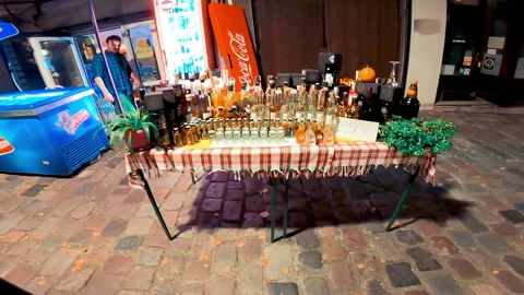 A liquor stand during night time in bohemian quarter Skadarlija in Belgrade. Stock Footage 160899412