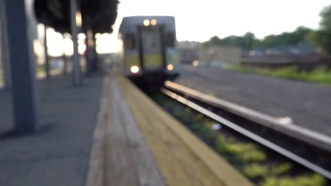 LIRR Commuter Rail pulling  into and out of a Station Stock Footage 93206180