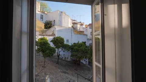 Lisbon Alfama Flying Through Window Video stock 91076456