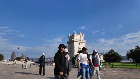 Lisbon Belem Spring Travel Scene With People Walking Through Popular Tourist Dis Stock Footage 344807264