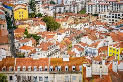 Lisbon hillside rooftops and dense residential buildings Stock Photos