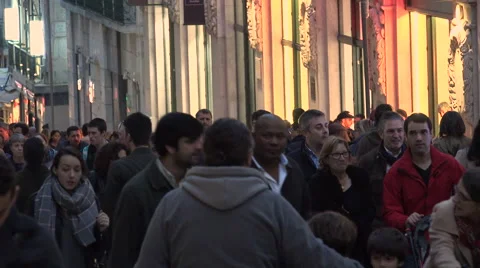 Lisbon Portugal Crowds of People walking through city centre in Winter Stock Footage 59592083