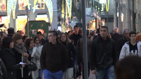 Lisbon Portugal Crowds of People walking through city centre in Winter Stock Footage 59592556