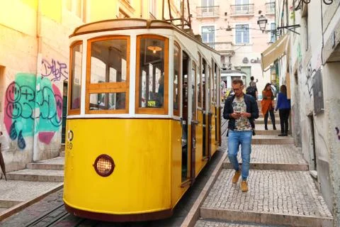 LISBON, PORTUGAL - JUNE 6, 2018: People ride the Bica Funicular (Ascensor de  Stock Photos