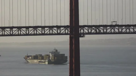 Lisbon Portugal view of the 25 de Abril Bridge over Tejo river Stock Footage 59592096
