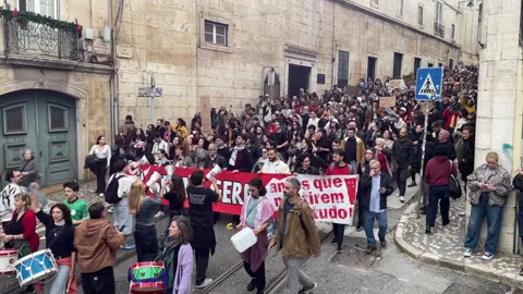 Lisbon Streets Filled with Large Group of Protesters Marching Stock Footage 325868974