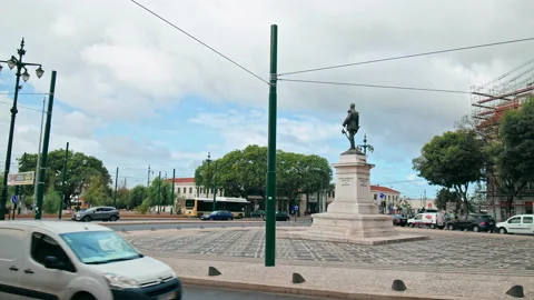 Lisbon traffic and local buses in central city by Estátua do Duque da Terceira. Stock Footage 169623331