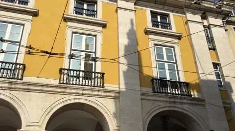 Lisbon trams running into a square Stock Footage 57564435