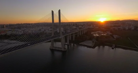 Lisbons vasco da gamma bridge in the sunset of beautiful Lisbon Stock Footage 91222564
