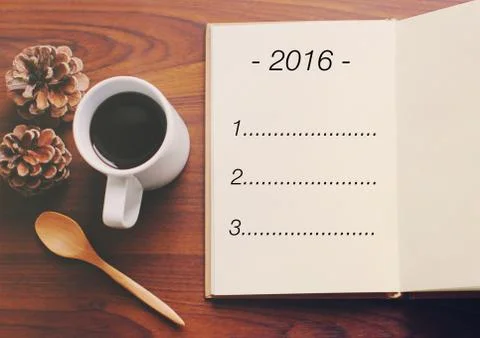 List of goals for 2016 on notebook with cup of coffee Foto stock