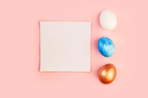 List or note isolated with set colorful eggs. Spring trendy composition on Stock Photos