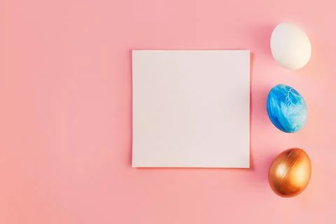 List or note isolated with set colorful eggs. Spring trendy composition on Stock Photos