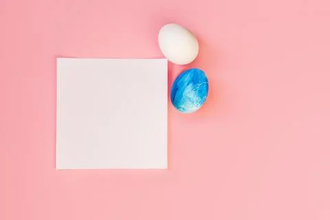 List or note isolated with set colorful eggs. Spring trendy composition on Stock Photos