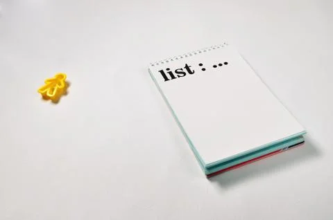 List text on notepad with office accessories. Business motivation, inspiratio Stock Photos